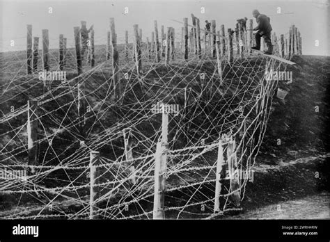 germans fixing barbed wire tangle     german
