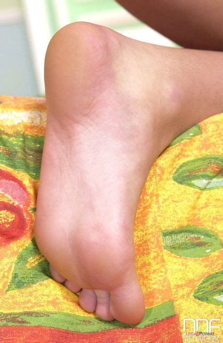 Blonde Model Dasha Gives A Footjob And Gets Her Feet Covered In Cum