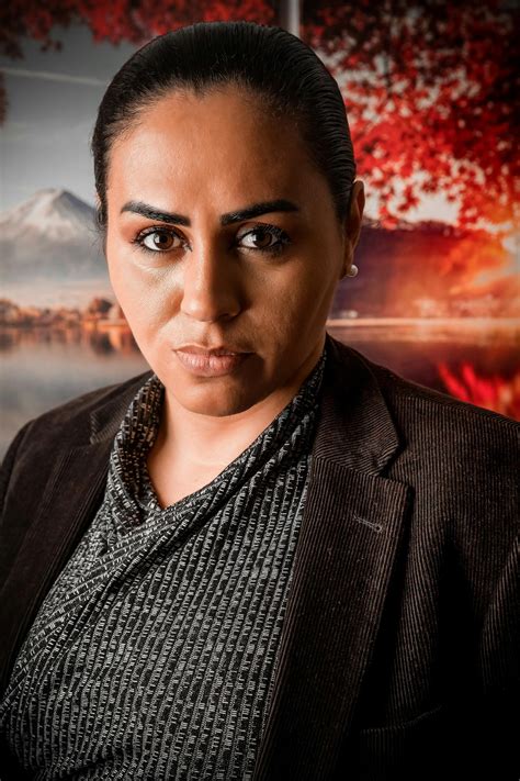 Women Wearing Blazer While Looking Over Shoulder · Free Stock Photo