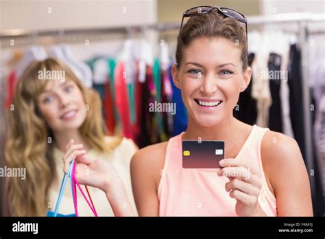 Customer Holding Shopping Bags And Credit Card Stock Photo Alamy