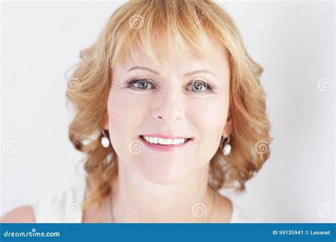 Elegant Portrait Of A Appealing Naked Brunette With Full Lips And Closed Eyes On The Black
