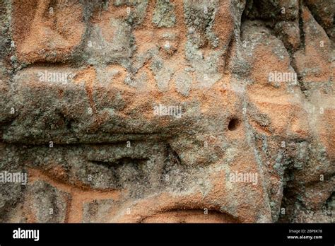 Old Mossy Carvings In Sandstone Stock Photo Alamy