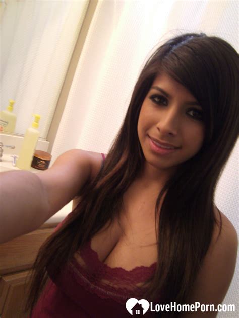 Babe Shows Off Sexy Curves At HomeMoviesTube