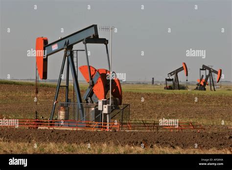 Pump Jacks In The Weyburn Oilfields In Scenic Southern Saskatchewan