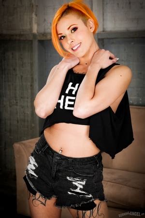 Gorgeous Rocker Babe Bends Over To Show Her XXX Dessert Picture