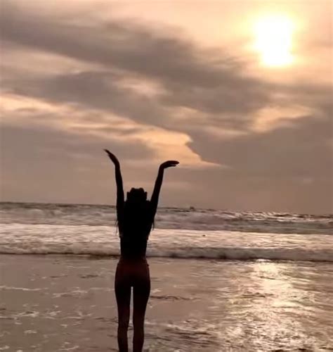 8 Potraits Of Erika Carlina Looking Hot With Exotic Skin On The Beach