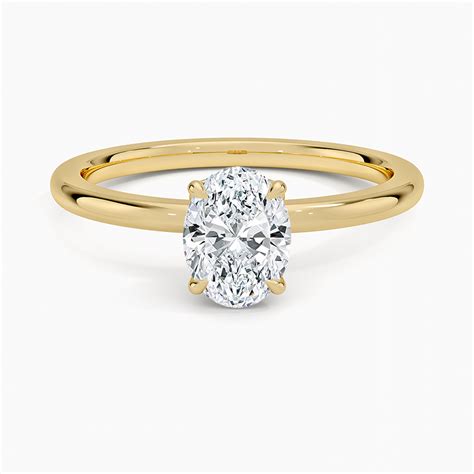 petal  prong diamond ring   yellow gold brilliant earth