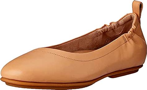 16 Cute And Comfortable Nude Ballet Flats To Complement Any Outfit