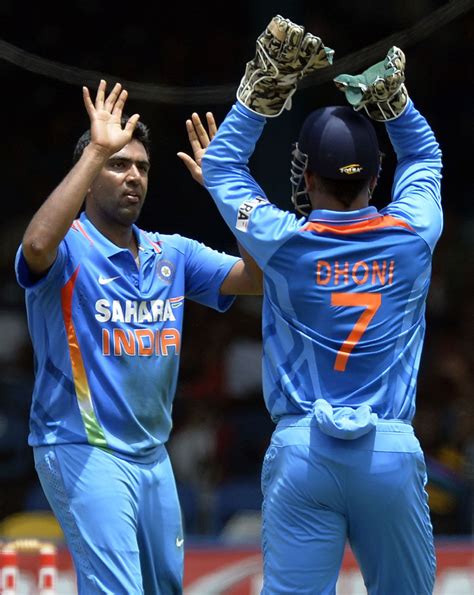 R Ashwin celebrates his double-strike with MS Dhoni | ESPNcricinfo.com