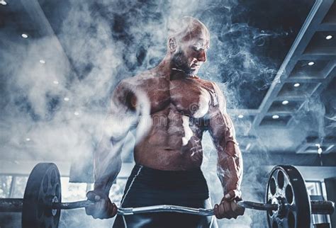 Muscular Man Working Out In Gym Doing Exercises With Dumbbells At Biceps Strong Male Naked