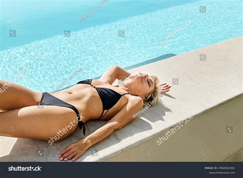 Blond Woman Wearing Bikini Lying On Stock Photo Shutterstock