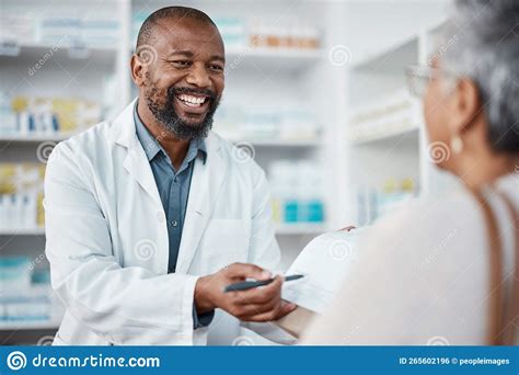 Pharmacy Medicine And Pharmacist In Discussion With A Patient