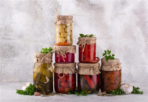 Pickled vegetables in glass jars. 39542935 Stock Photo at Vecteezy