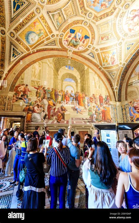 The Vatican Museum The Stanza Della Segnatura Room With People Looking