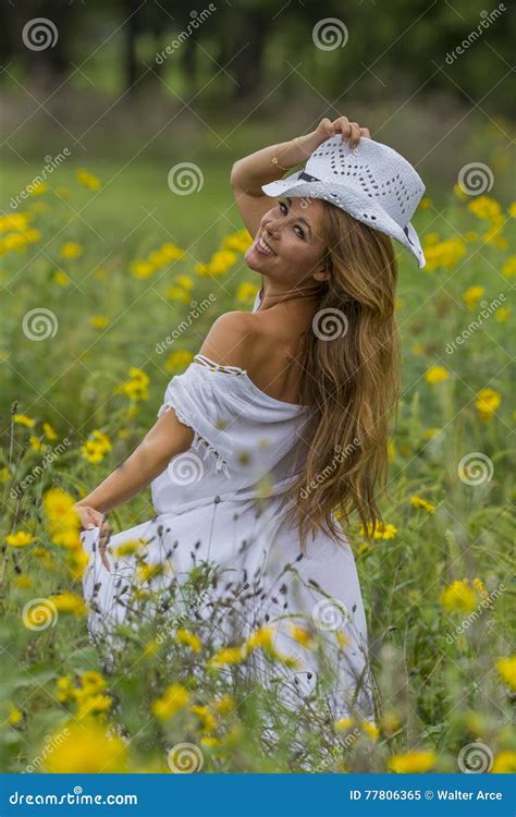 Brunette Model In A Field Of Flowers Stock Image Image Of Elegant Country 77806365