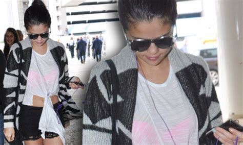 Selena Gomez Looks Sexy In A Sheer Crop Top And Lacy Hot Pants Daily Mail Online