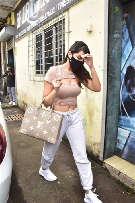 In Pics Nora Fatehi Matches Her Nude Colour Crop Top With A Louis Vuitton Bag