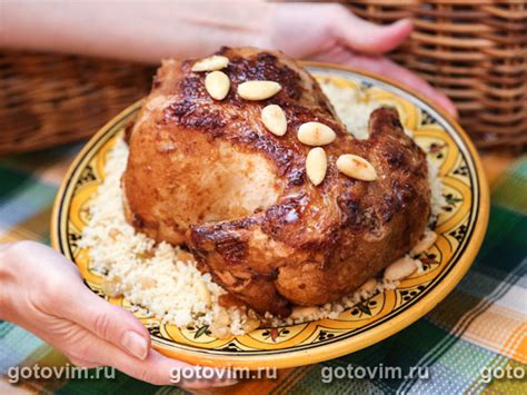 Курица, фаршированная кус-кусом с орехами и медом. Рецепт с фото