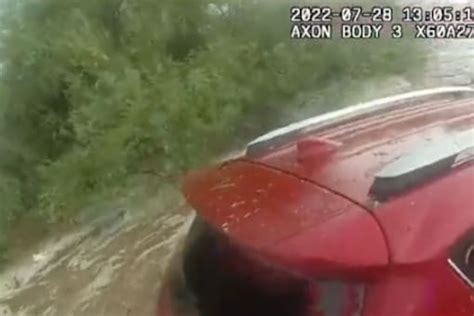 Watch Police Officers Rescue Woman Stuck Inside Car Amid Floods News18