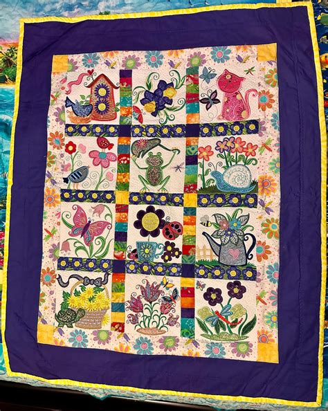 Mylar Embroidered Quilt With Applique Using Fun Designs And Bright