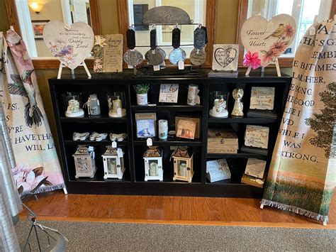 Staff members help explain the options at brucker and kishler funeral home 33