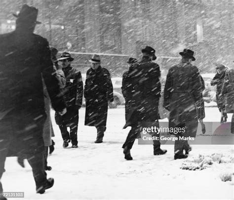Man Walking Against Wind Photos And Premium High Res Pictures Getty