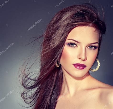 Beautiful Brunette Wearing Earrings Stock Photo EdwardDerule 34377053