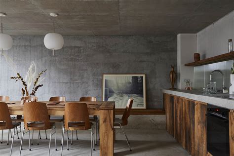 Rotunnojustman Combines Naked Concrete Details With Brick To Form Sleek Interiors For Photo Studio