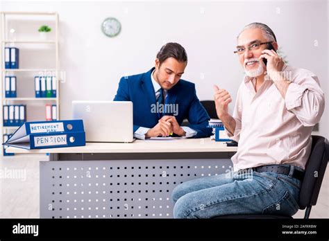 The financial advisor giving retirement advice to old man Stock Photo ...