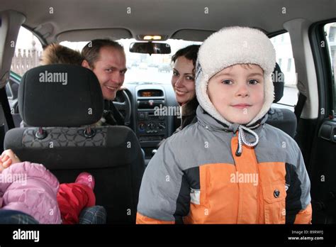 family in car Stock Photo - Alamy