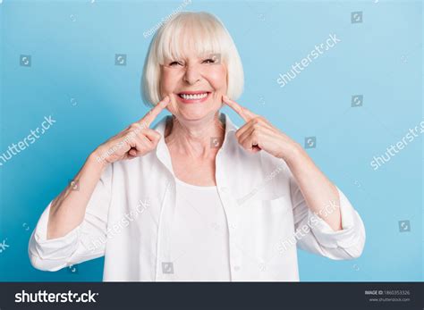 Photo Portrait Granny Blonde Hair Pointing Stock Photo 1860353326 Shutterstock