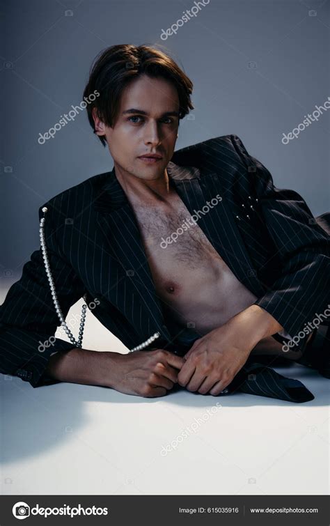 Stylish Brunette Man Suit Pearls Posing Dark Grey Stock Photo By Allaserebrina