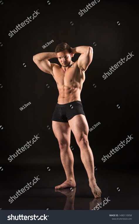 Strong Athletic Man Showes Naked Muscular Stock Photo 1490110958