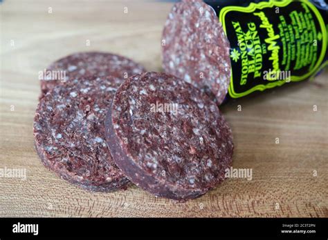 sliced stornoway black pudding in the uk Stock Photo - Alamy