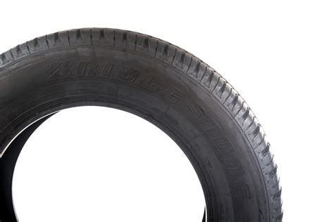 Pneu BRIDGESTONE DUELER 215/65 R16 H/T - Genebra Autopeças - Peças ...