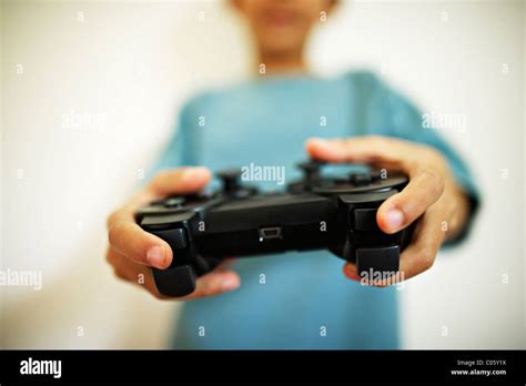 Boy plays computer games Stock Photo - Alamy