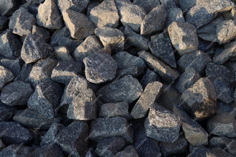 premium photo  concrete material aggregate stone background