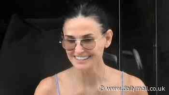Demi Moore Shows Off Her Incredible Figure In A Skimpy Blue Bikini As She Soaks Up The Sun