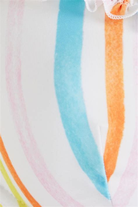 SOLID STRIPED The Daphne Ruffled Striped Bikini Top THE OUTNET