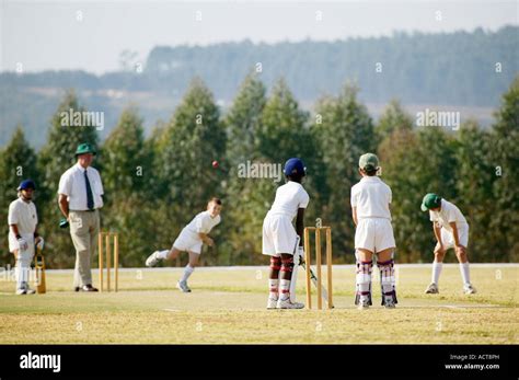 Primary School Children Playing A Cricket Match In The Lowveld