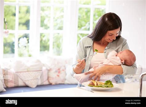 Baby Mother Lunch Babe Babies Human Babies Mom Mothers Mum Lunch Time Stock Photo Alamy