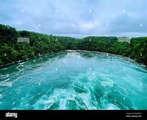 A High Angle Closeup Of A Niagara Whirlpool With Flowing Water Green