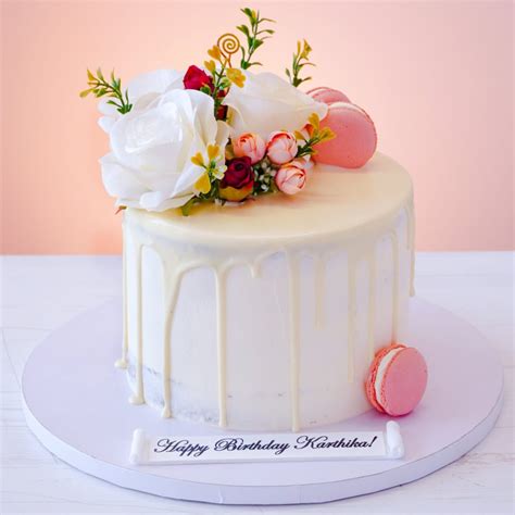 Exquisite Naked Dripping Cake With Roses In Dubai The House Of Cakes Bakery