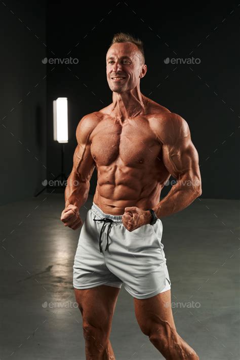 The Caucasian Athlete S Fists Are Clenched The Whole Body With A Naked Torso Is In Tension