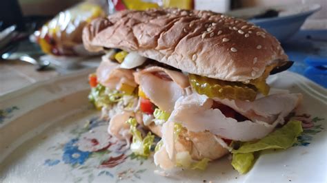 Sf boudin seeded sandwich roll, shredduce, balsalmic dressing, turkey