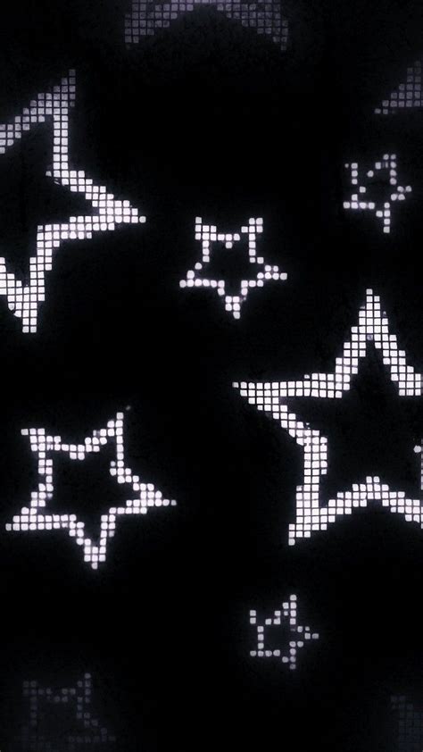 Some White Stars On A Black Background