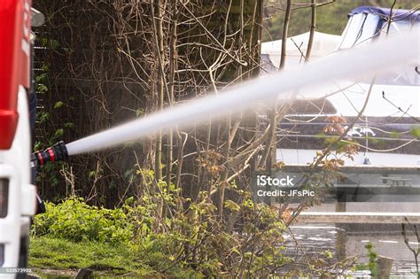Fire Department Sprayed Extinguishing Water During An Exercise Stock