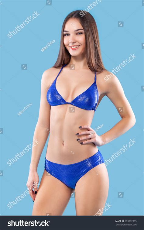 Sexy Blonde Woman Wearing Pink Swimwear Stock Photo