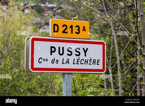 Sign To A French Village Called Pussy In The Tarentaise Savoie Rhone Alpes France Stock Photo