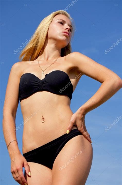 Sexy Blonde In A Swimsuit Stock Photo By Rrraum 119968812
